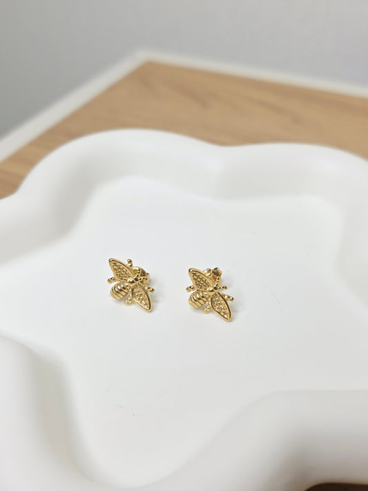 Bee stud earrings gold