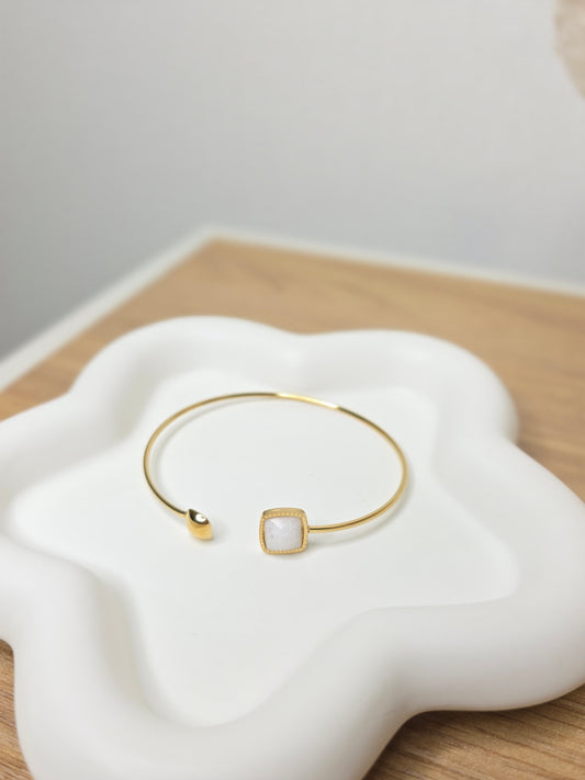 white stone bangle gold